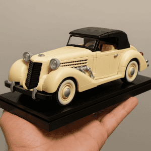 Vintage Lego model of a classic cream-colored convertible car with black roof.