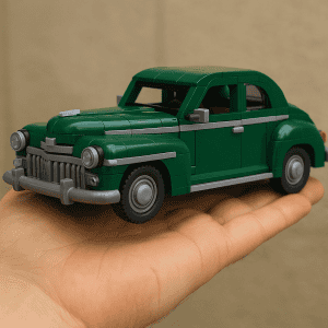 Mini LEGO vintage green car model held in hand, detailed and realistic LEGO creation.