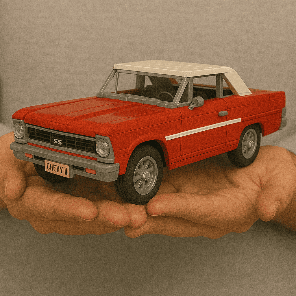 Mini LEGO Chevy II model car in red with white stripe on person's hand.