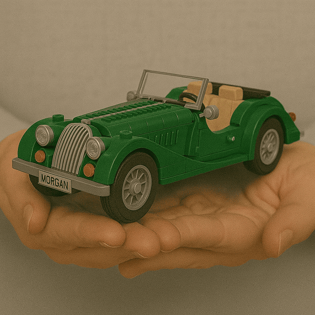 Miniature green LEGO vintage convertible car with beige interior on hand.