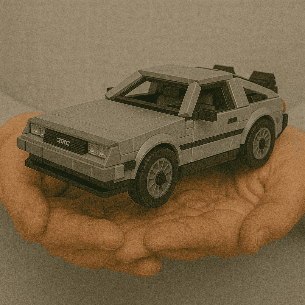 Lego car model built with LEGO bricks, held in a person's hand, showcasing detailed craftsmanship.